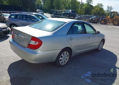 2004 Toyota Camry Xle z USA, uszkodzony, nr VIN 4T1BE30K54U928149